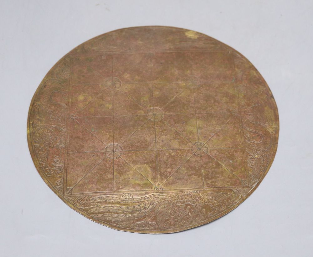 A Chinese 19th century brass games board, diameter 24cm